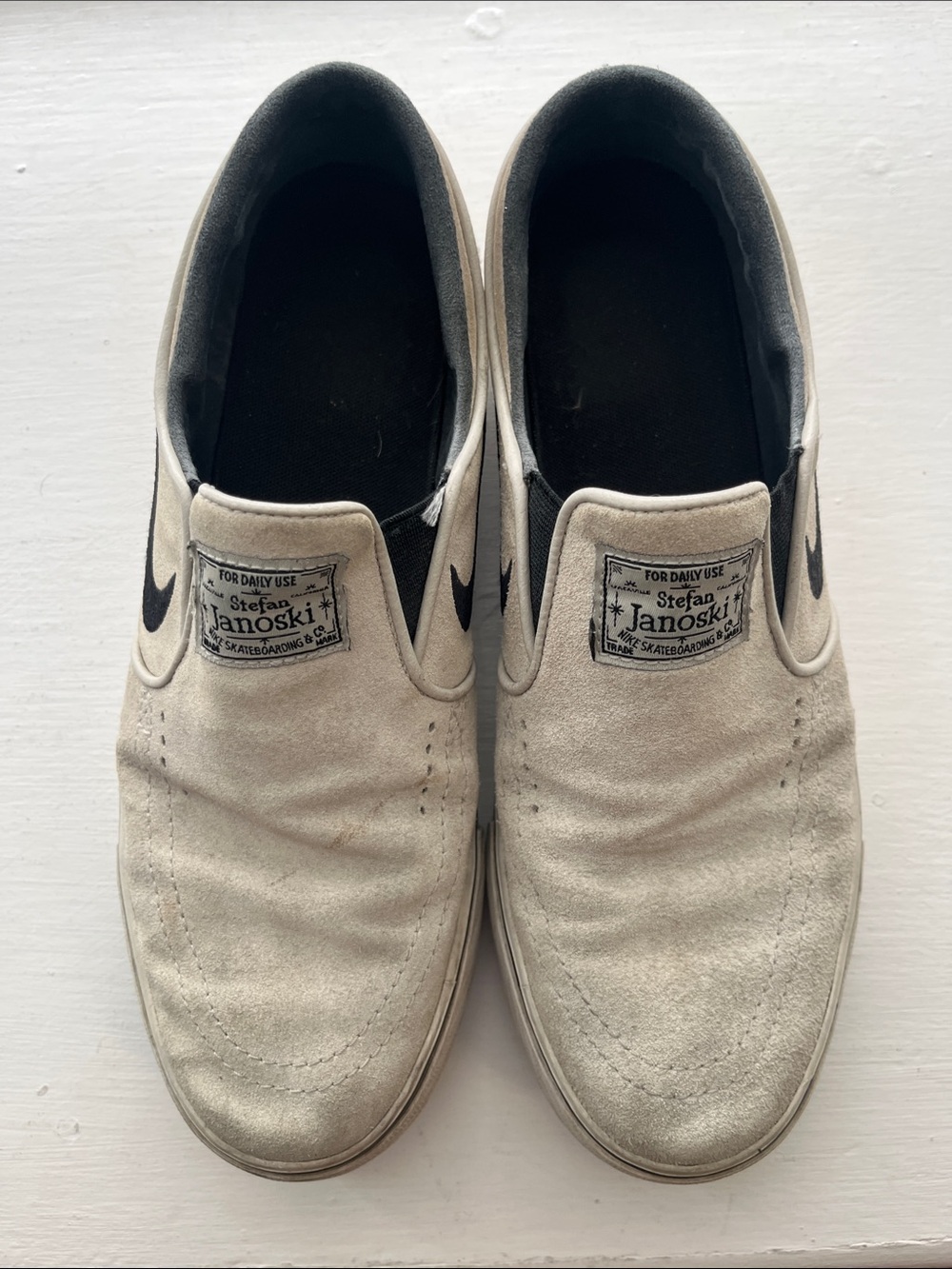 Nike Stefan Janoski Slip-On Loafers in White and Black
